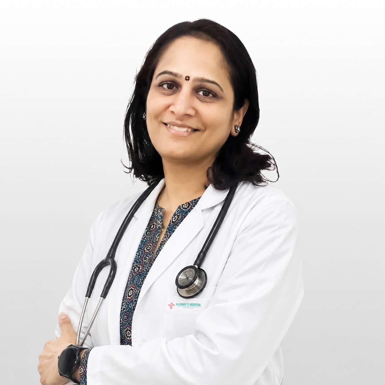 Dr. Veena P